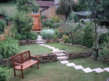 View of lawn and seating in garden